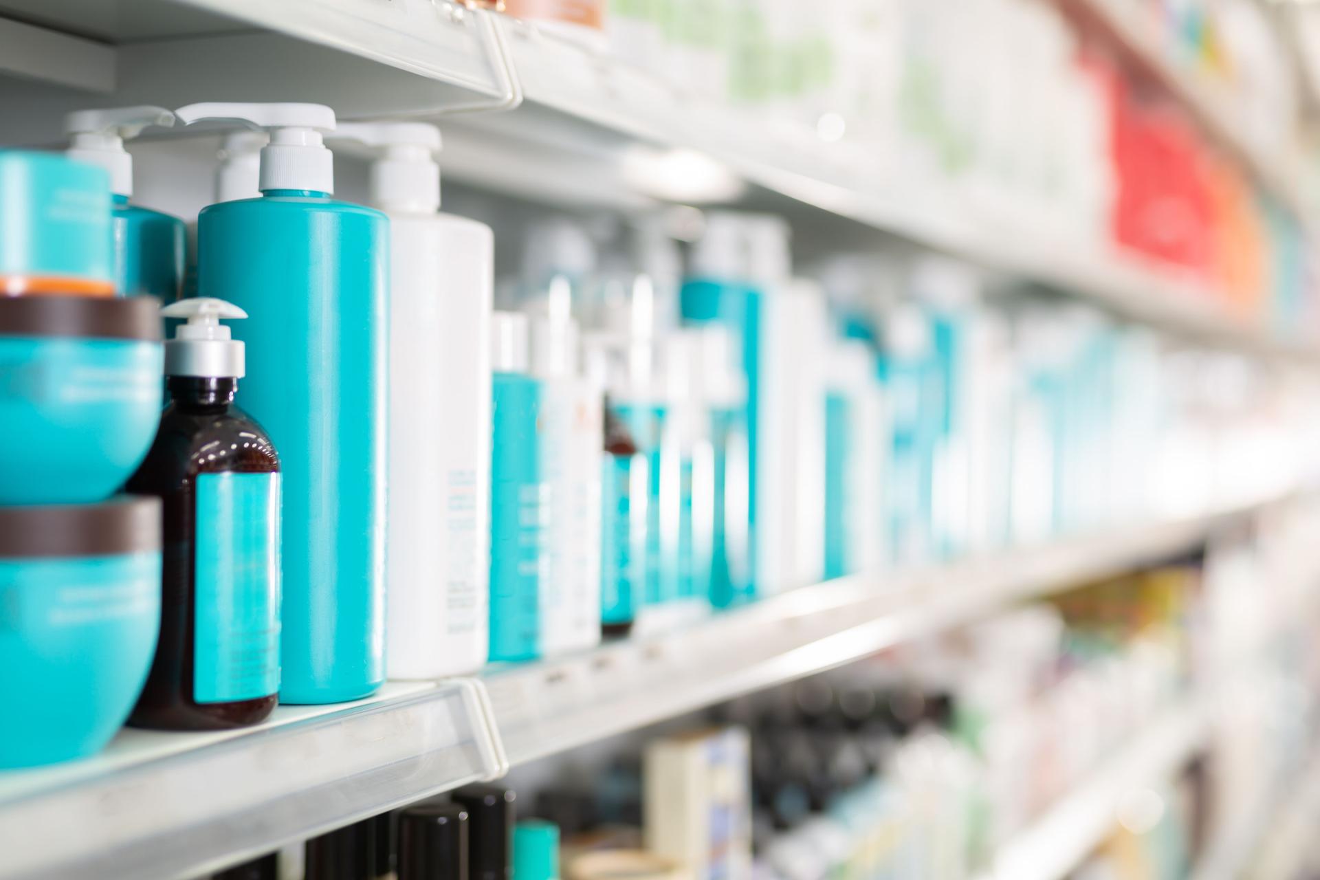 Hair care products on store shelves in supermarket