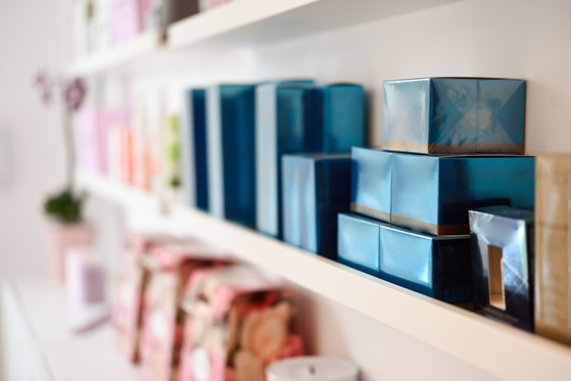 Cosmetic section with facial cream in beauty salon